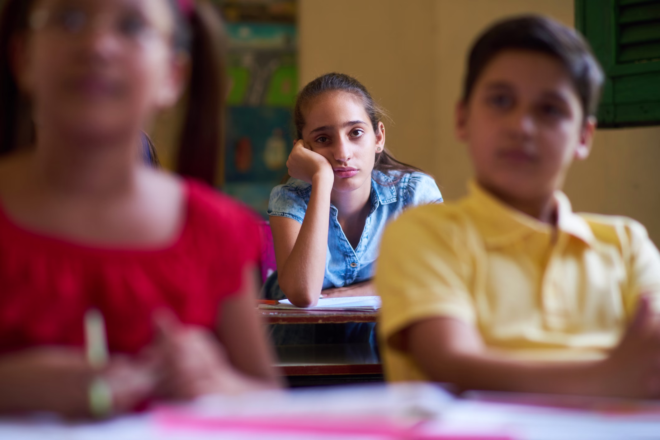 Bored Female Student Latina Girl In Class At School iStock 641285798